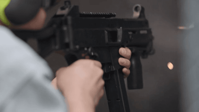 Person practicing shooting at a range