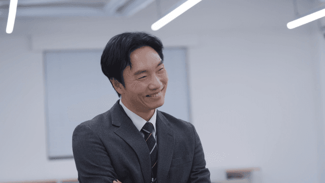 An office worker smiling in an office