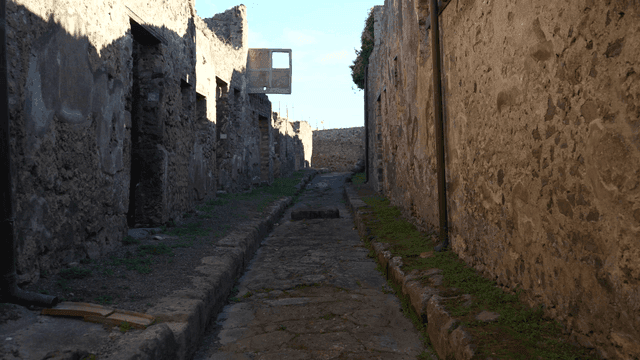 Ancient stone pathway between ruins