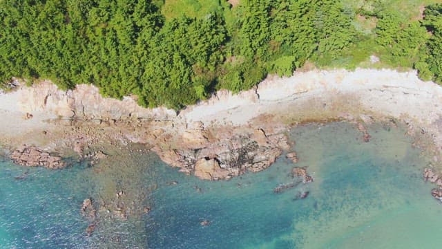 Rocky coastline with clear blue water