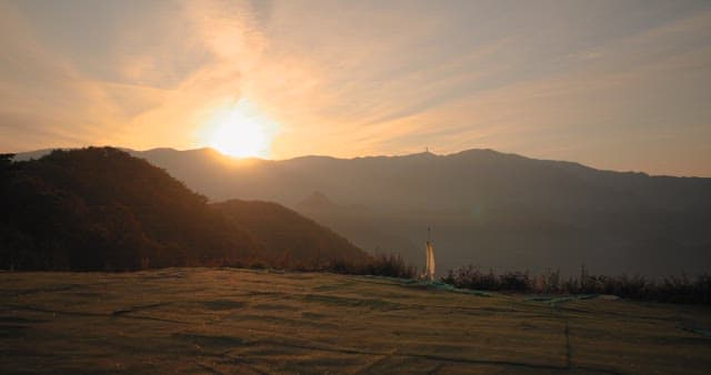 Sunset over mountainous landscape