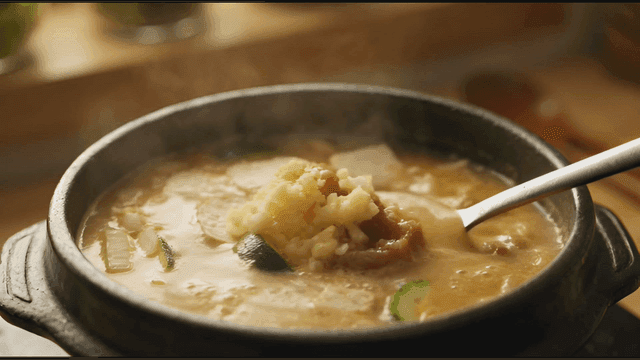 Soybean paste rice boiling hot in earthenware pot