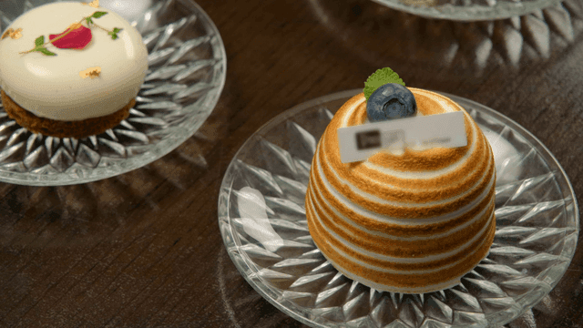 Elegant desserts on glass plates