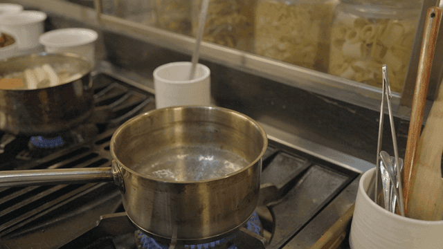 Pot of boiling water in kitchen