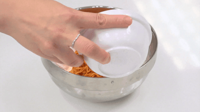 Ice poured over bibim ramyeon