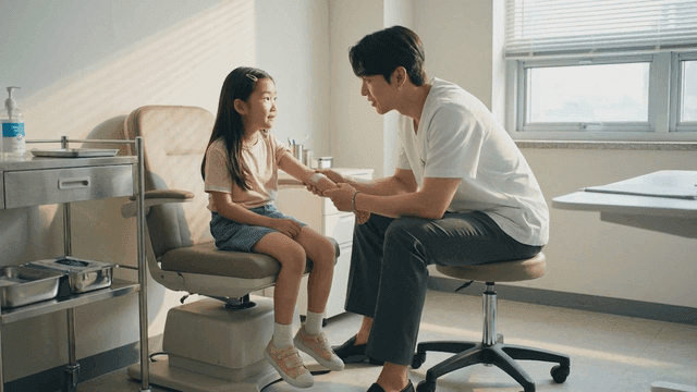 Doctor who put bandage on child's arm in examination room