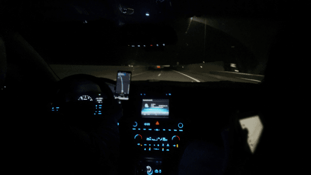 Night drive on a highway with navigation