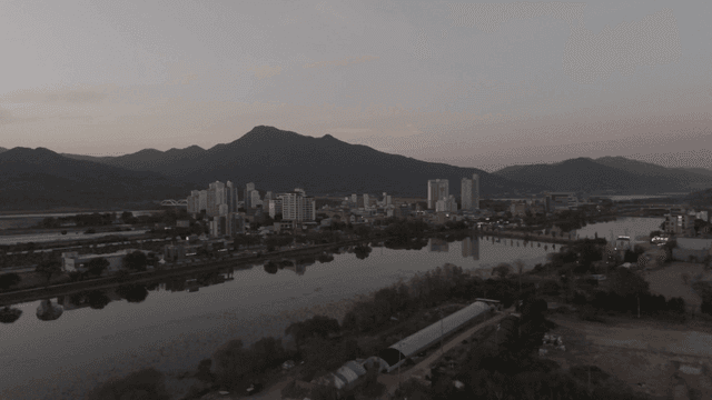 Cityscape with mountains and rivers