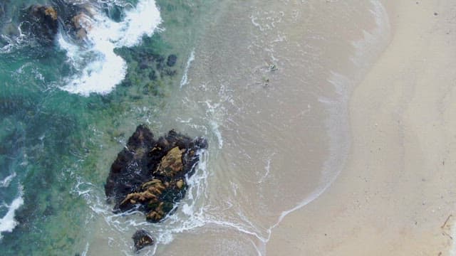 Waves crashing on a rocky beach