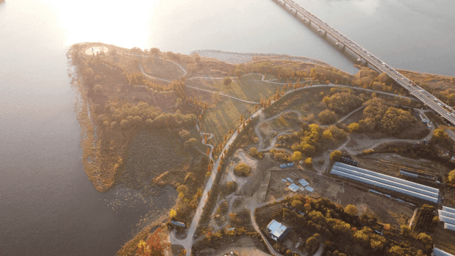 Scenery of riverside park with walking path