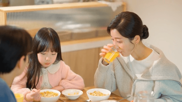 Family enjoying breakfast together