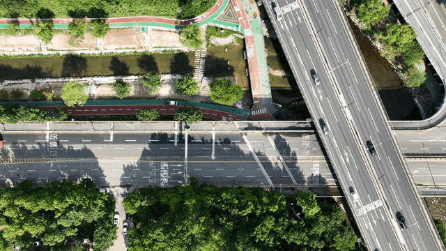 Wide road and river aerial view