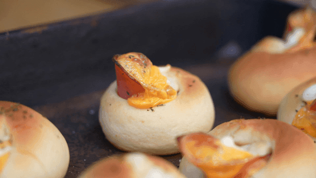 Freshly baked bread with cheese and ham