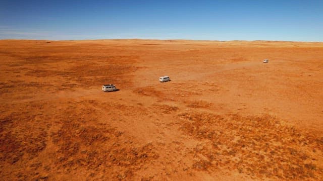 Vehicle Driving in a Barren and Vast Desert