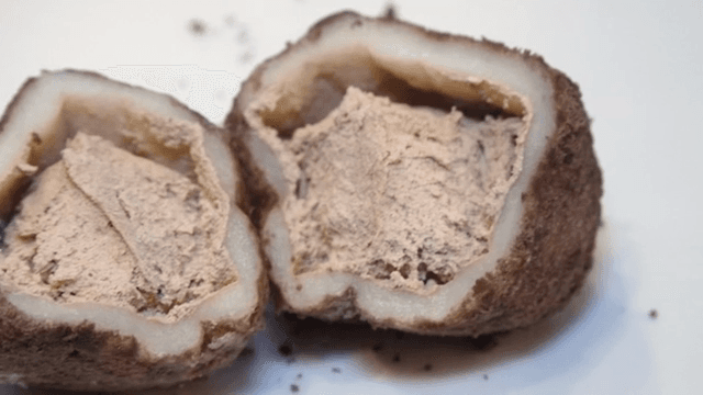 Close-up of a sliced rice cake with creamy filling