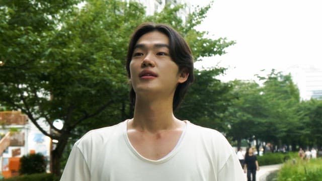 Young man enjoying a walk in the park