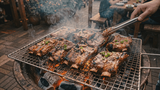 Marinated pork ribs on barbecue grill