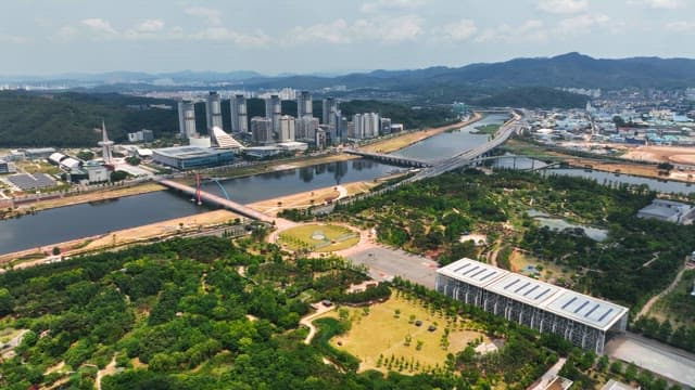 Green park with cityscape background