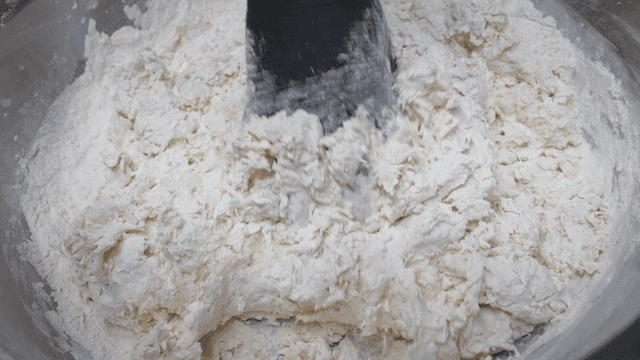 Mixing dough in a bowl
