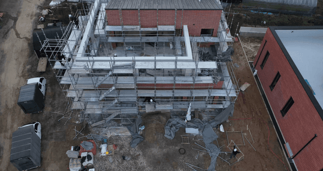 Construction site with scaffolding and workers