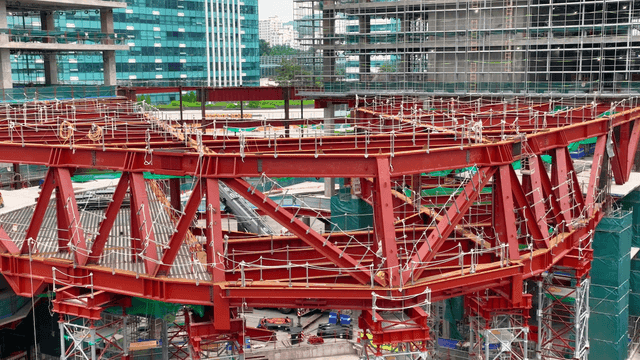 Construction site with red steel beams