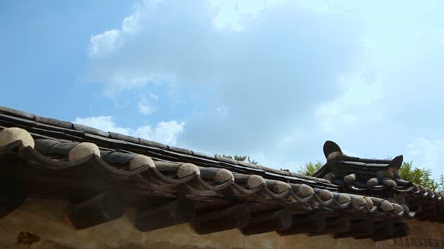 Traditional Korean Roof Tiles with Blue Sky