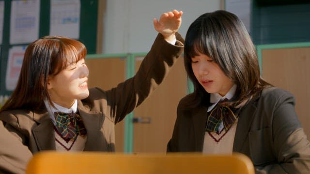 Students chatting in a classroom