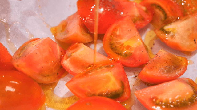Fresh tomatoes drizzled with olive oil