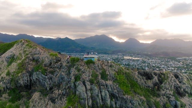 Majestic Mountain Range Overlooking a Coastal Town