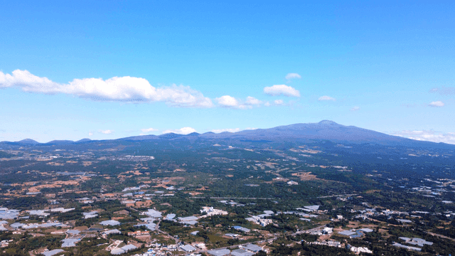 Vast landscape of mountains and fields