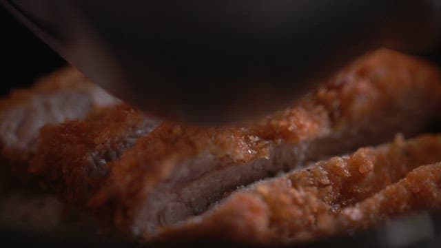 Sauce covered on top of crispy fried pork cutlet