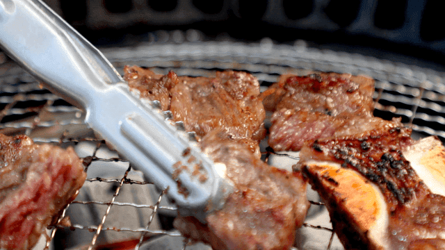 Marinated beef short ribs grilled on hot plate