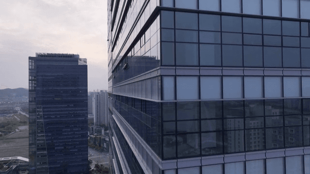 Modern high-rise building facade in cityscape