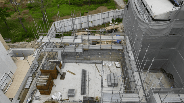 Construction site with scaffolding and materials
