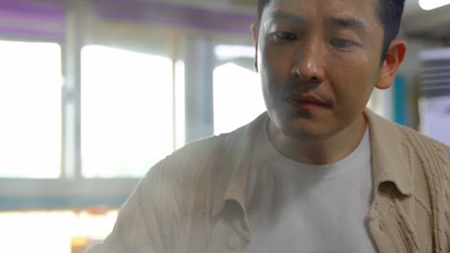 Man enjoying a hot meal indoors