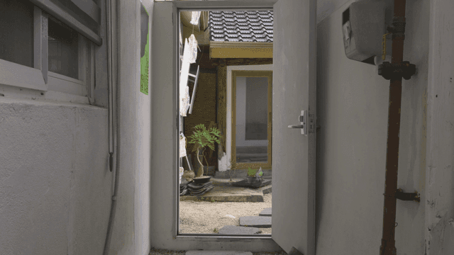 Traditional Hanok visible through door