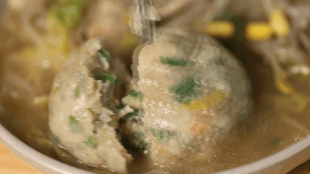 Pyeongan-do style rolled dumpling soup eaten by breaking it apart with chopsticks