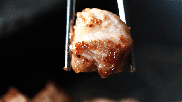 Meat grilled with chopsticks