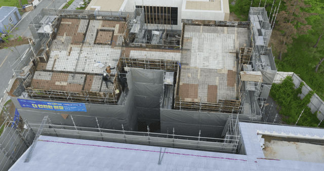 Construction site with scaffolding and workers