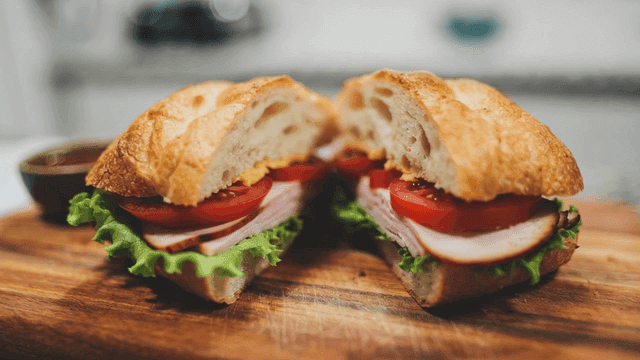 Fresh sandwich with lettuce and tomatoes