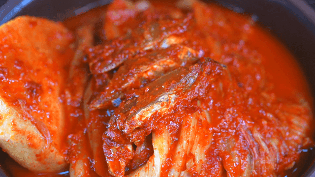 Kimchi in a bowl with rich red seasoning