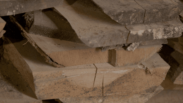 Close-up shot of stacked wooden planks