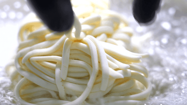 Noodles boiled in pot and added to broth