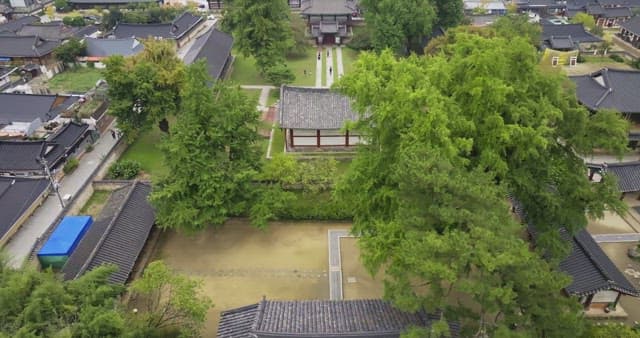 Traditional Korean village with lush greenery