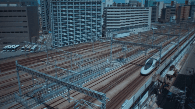 High-speed train passing through city