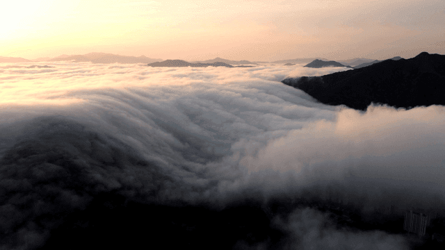 Sea of ​​clouds above mountain range