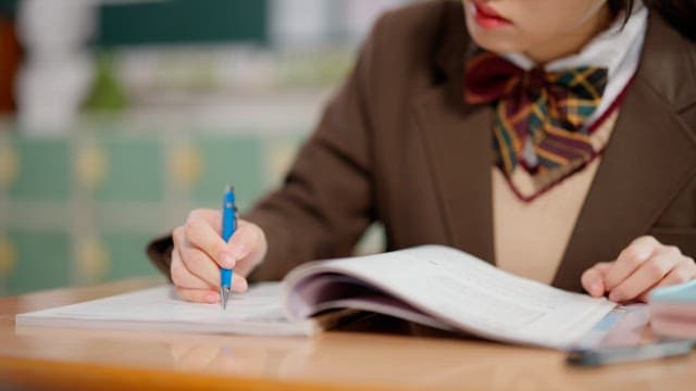 Student studying in a classroom