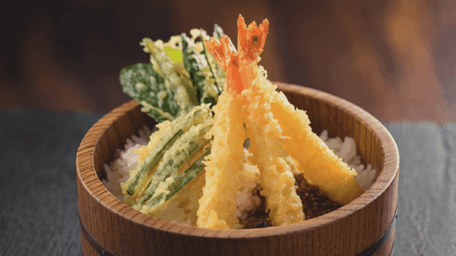 Tempura rice bowl in wooden bowl