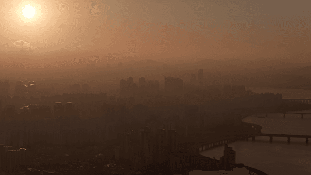 City skyline at sunset with river view