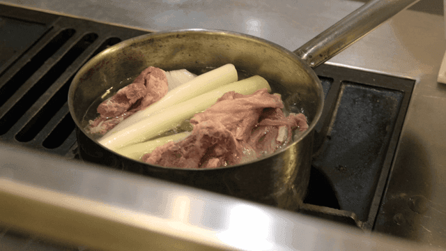 Boiling meat and vegetables in a pot